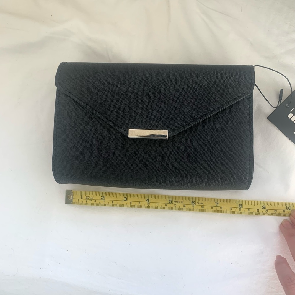 Brand new Black clutch / Cross body purse with clear touchscreen back side